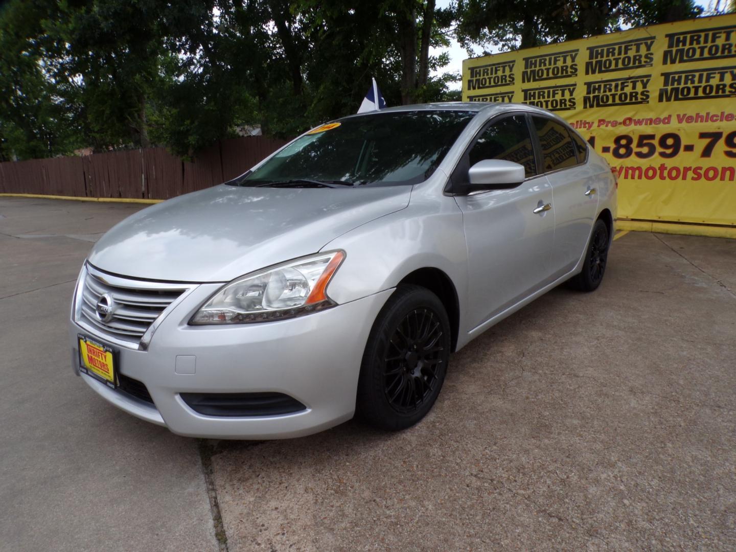 2014 /BLACK Nissan Sentra S 6MT (3N1AB7AP9EY) with an 1.8L L4 SFI DOHC 16V engine, 6-Speed Manual transmission, located at 16710 Clay Rd., Houston, TX, 77084, (281) 859-7900, 29.834864, -95.656166 - Photo#3